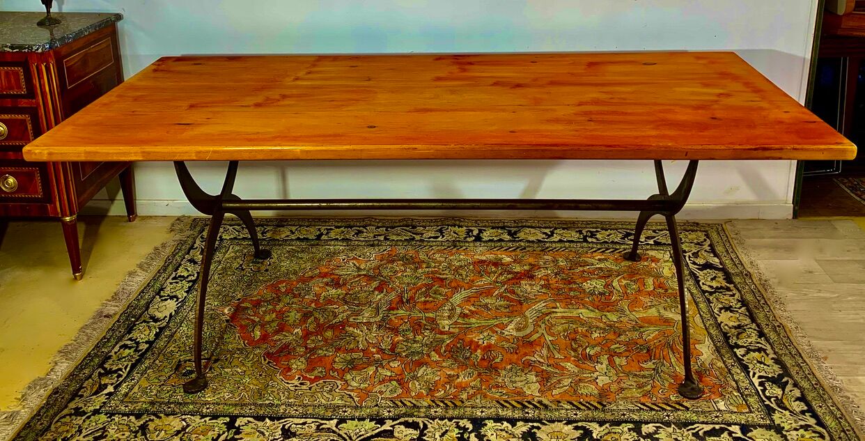 Rectangular wooden table, legs and spacer in hammered ironwork, 60s