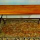 Rectangular wooden table, legs and spacer in hammered ironwork, 60s