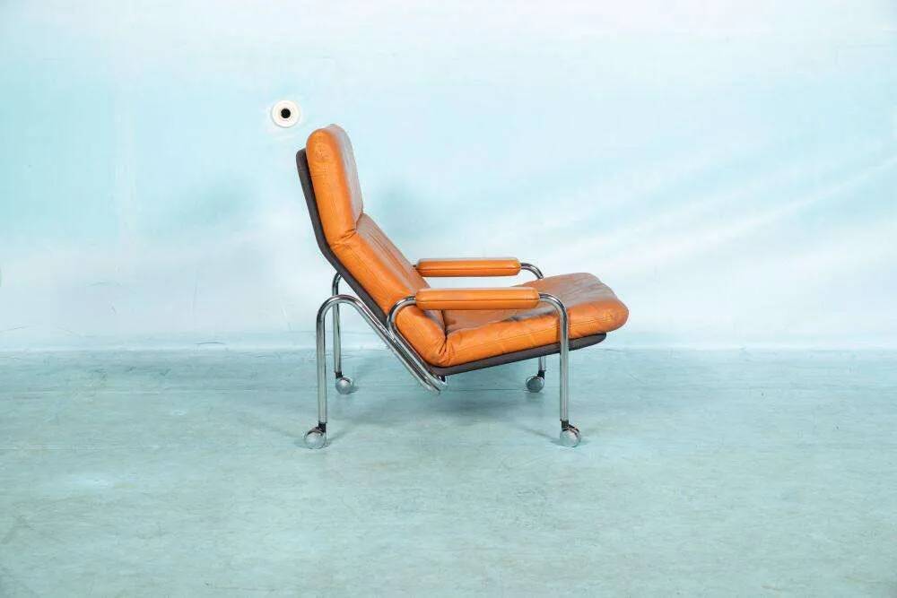 60s cognac leather designer armchair, mid-century modern leather lounge chair.
