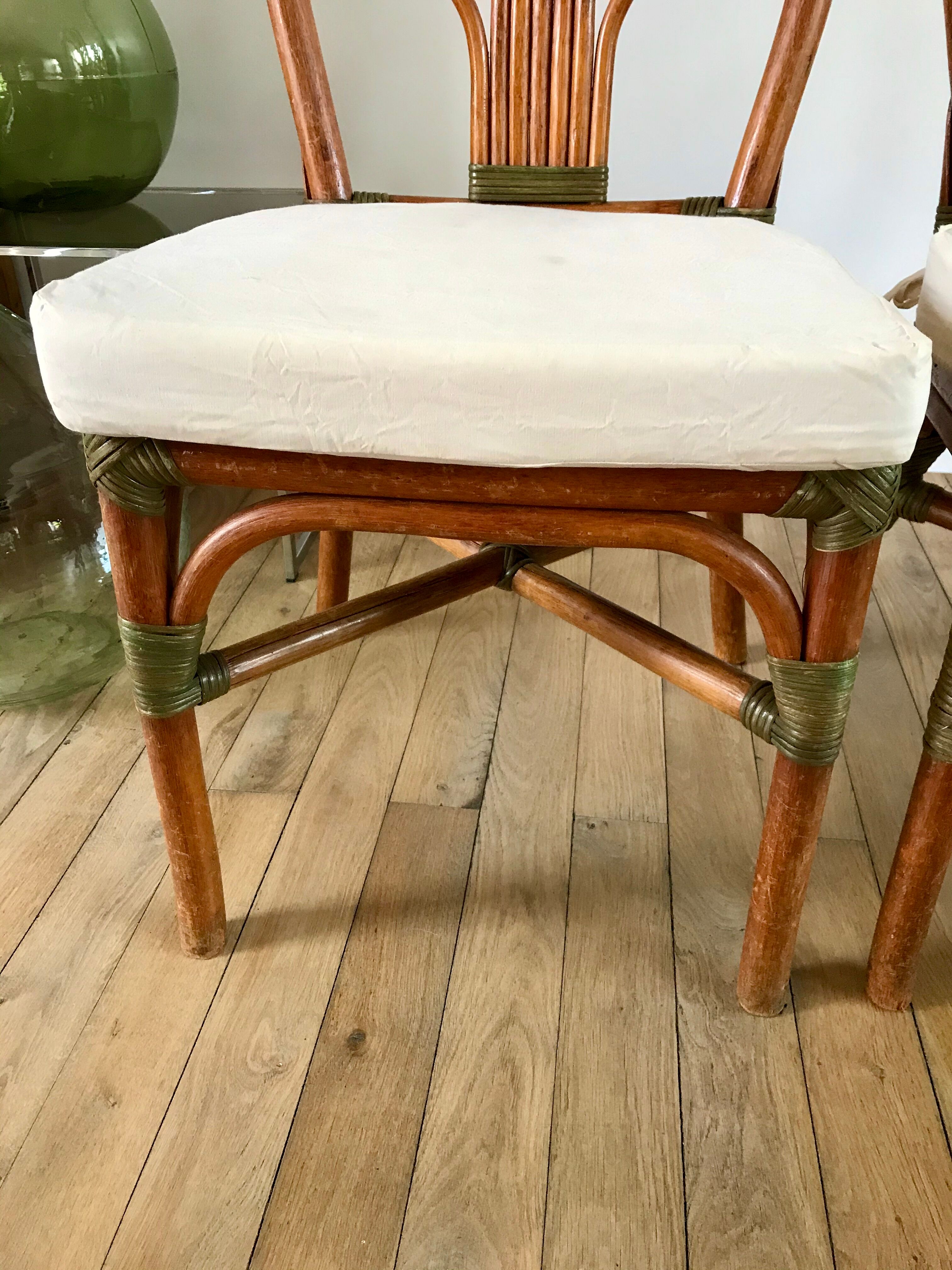 Set of 3 rattan / bamboo chairs with cushions years 1960-1970