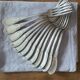 Set of 12 vintage silver-plated metal forks.