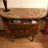 Half-moon chest of drawers