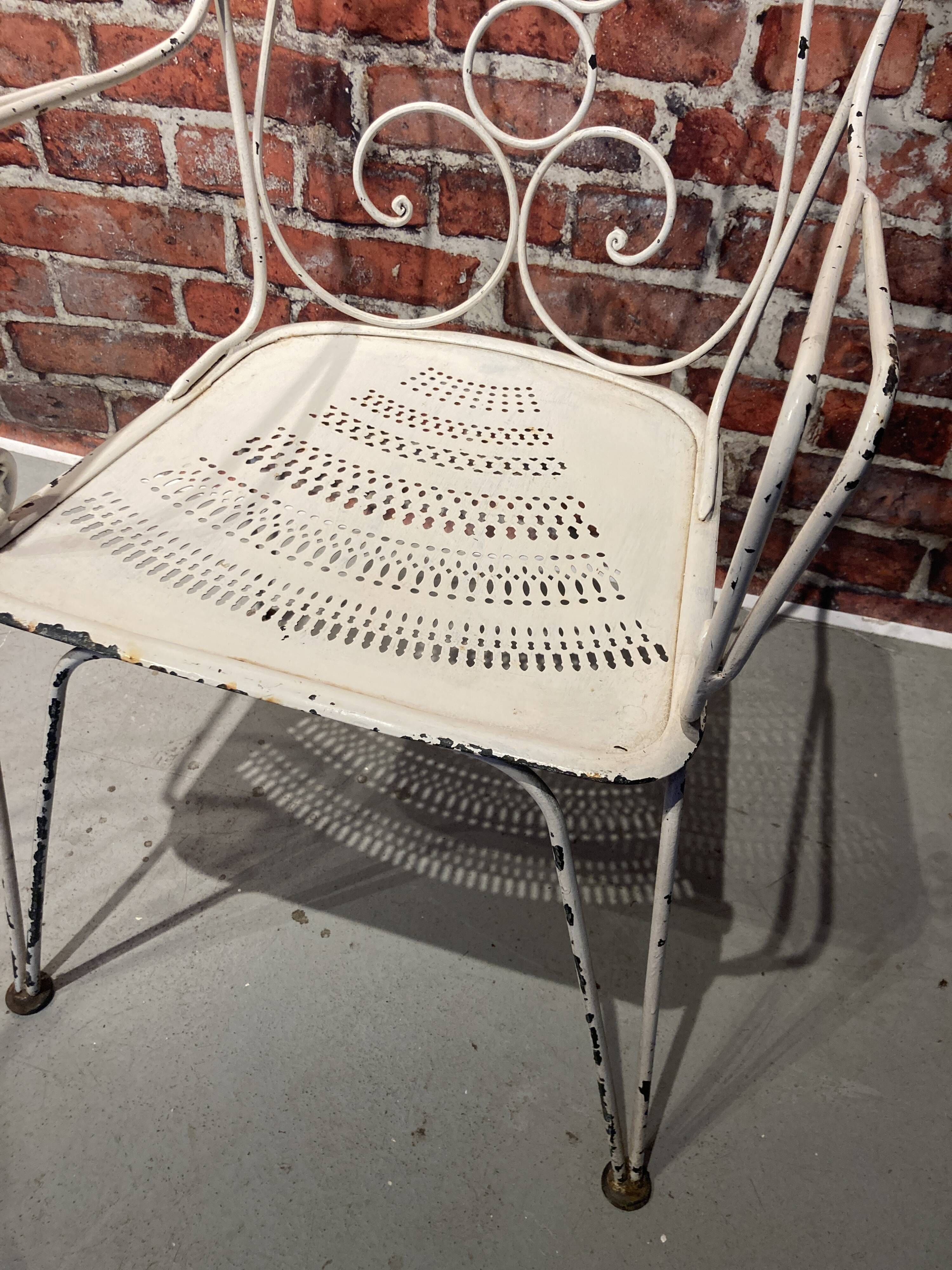 Wrought iron garden set painted white