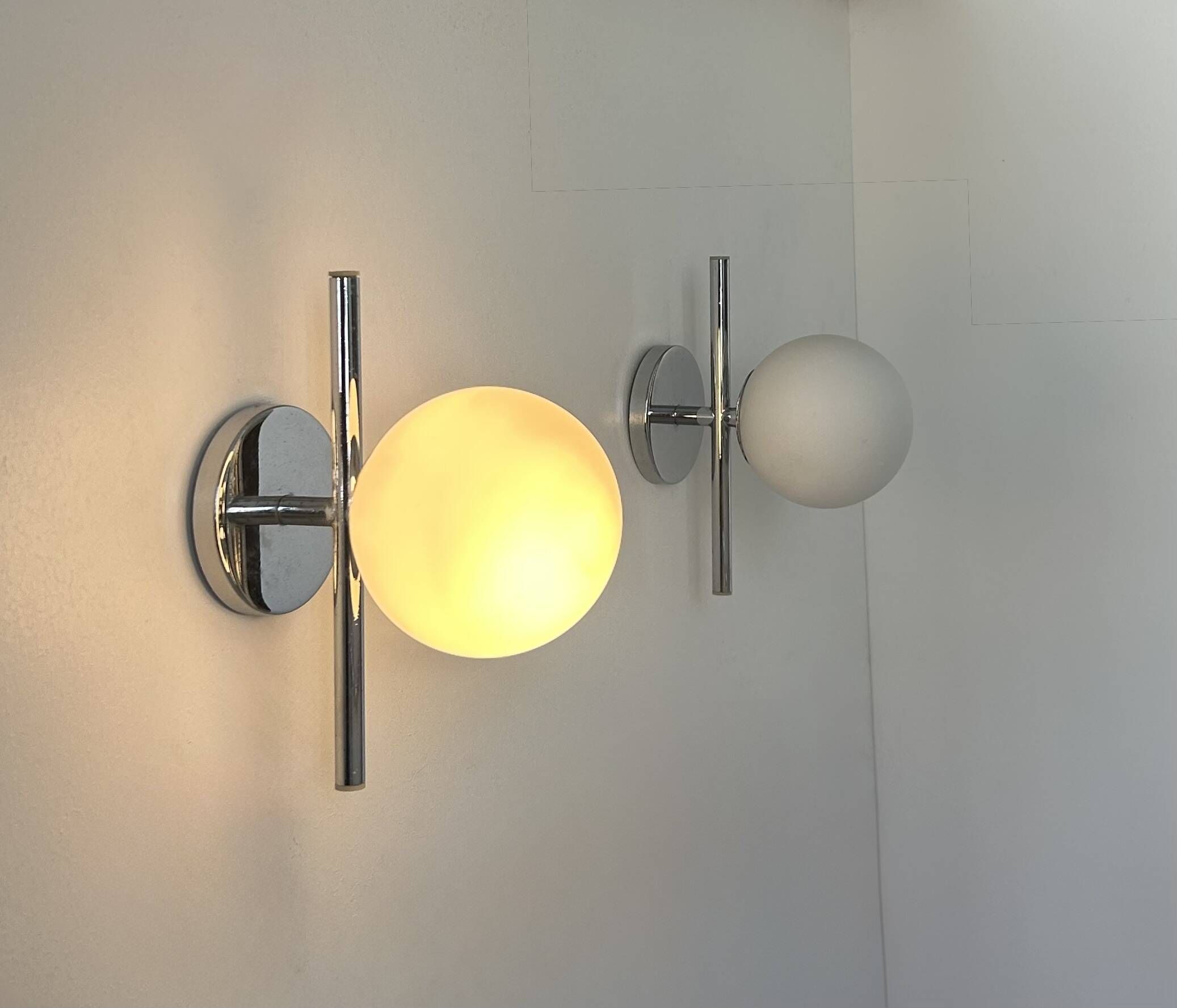 Pair of vintage chrome and opaline wall lights, France 1970.