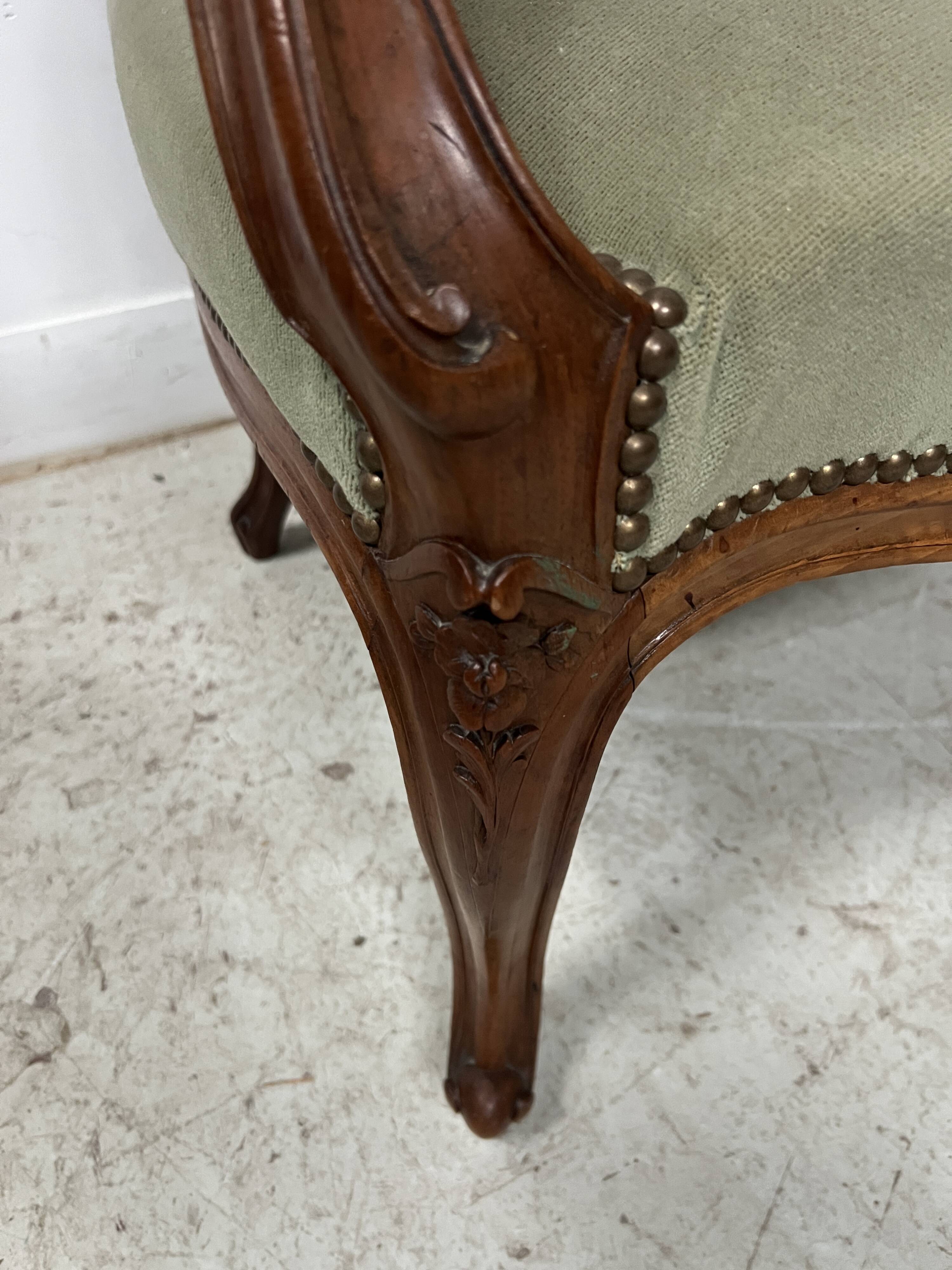 Pair of Louis XV style armchairs in solid walnut, 20th century.