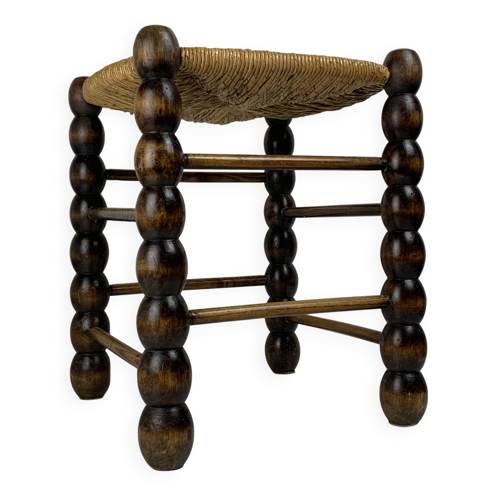 Brutalist wood turned bobbin rush stool in the style of Charles Dudouyt