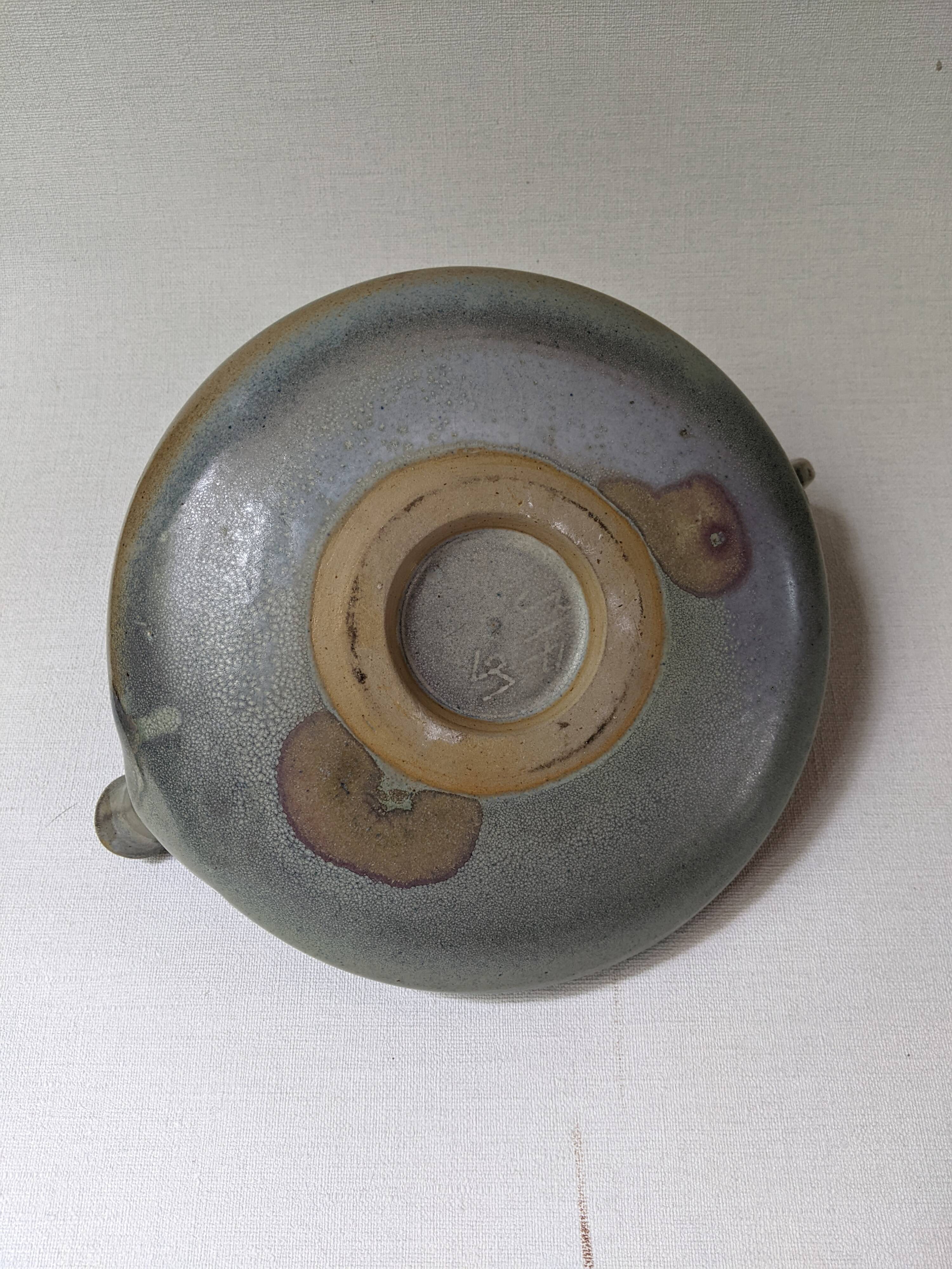 Ceramic teapot, artisanal, Japandi countryside decoration.
