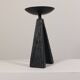 Vintage candle holder made of hand-forged metal, in a brutalist style.