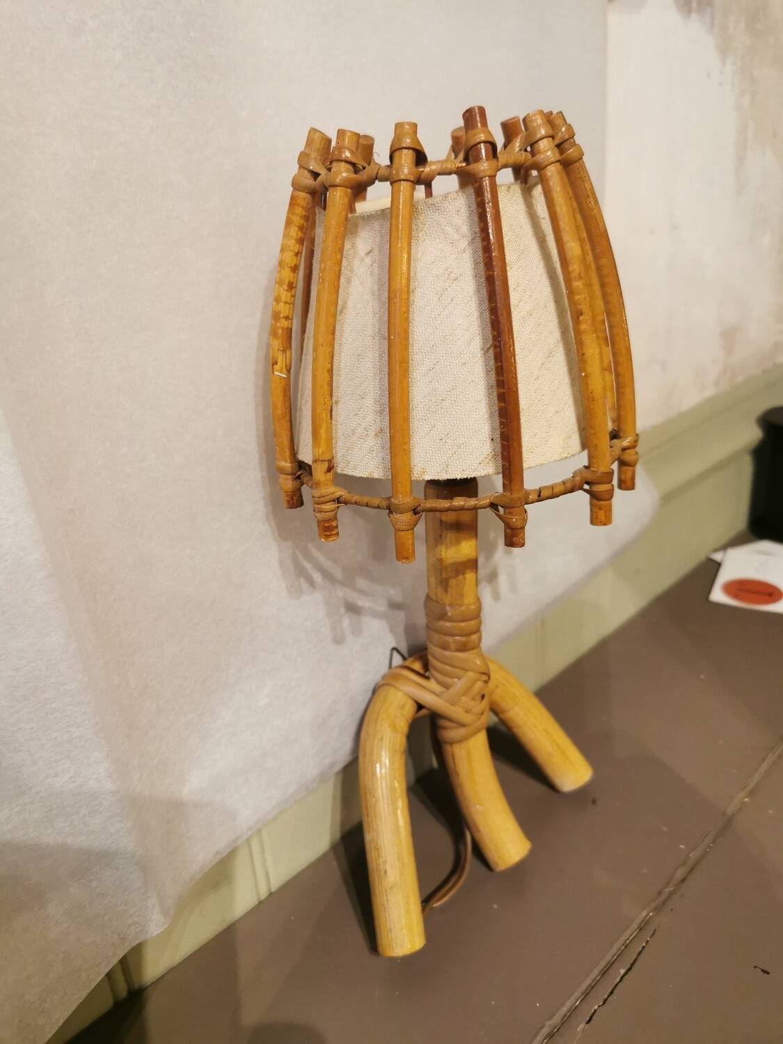 Vintage rattan wall light by Louis Sognot