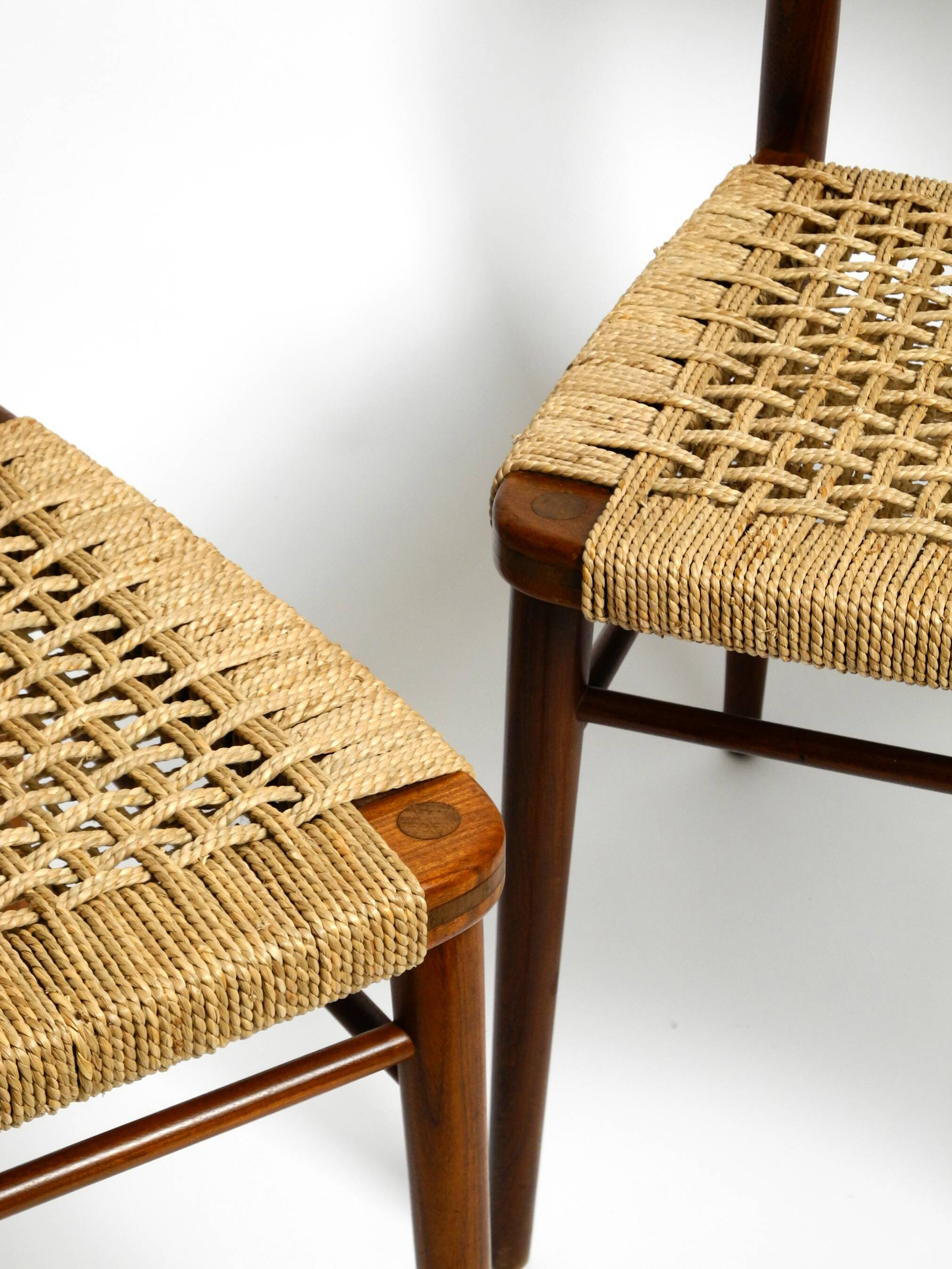 Two original 1960s Wilkhahn chairs made of walnut with wicker cane