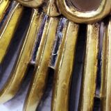 Sun mirror in wood and gilded stucco