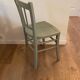 Chaise bistrot Luterma vintage verte grisée