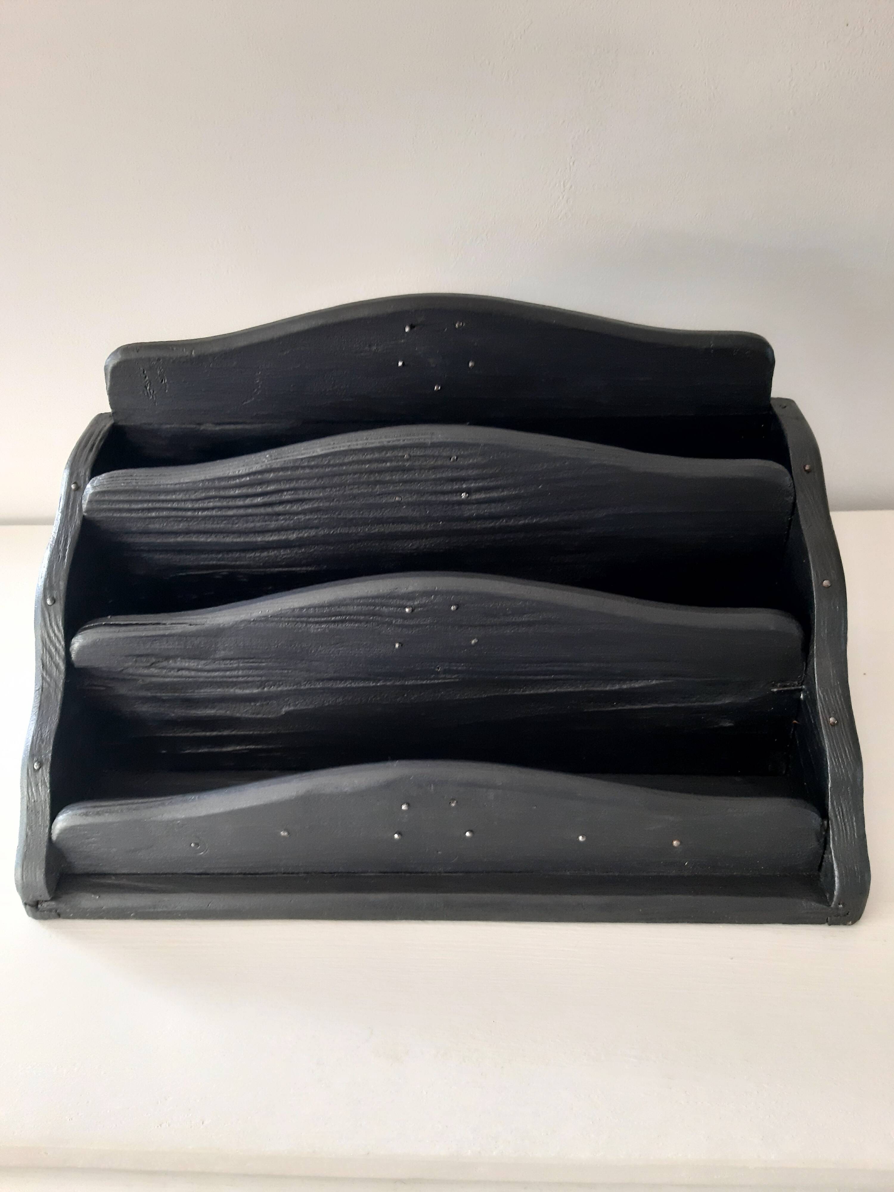 Old letter holder valued