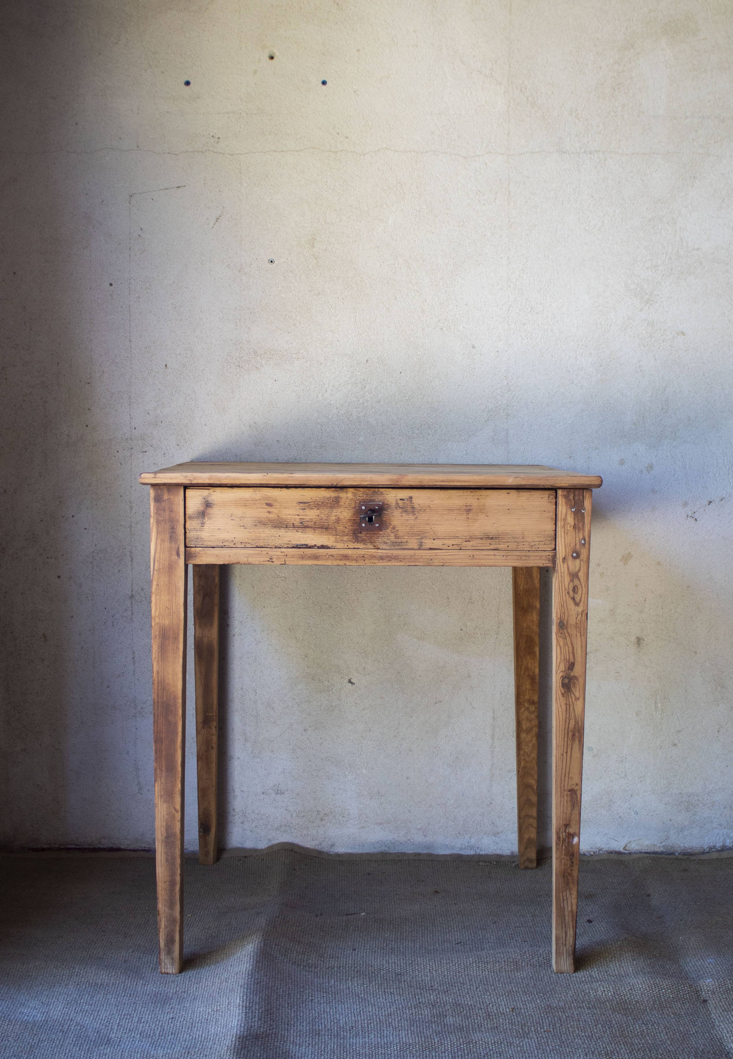 Small vintage desk made of solid wood.