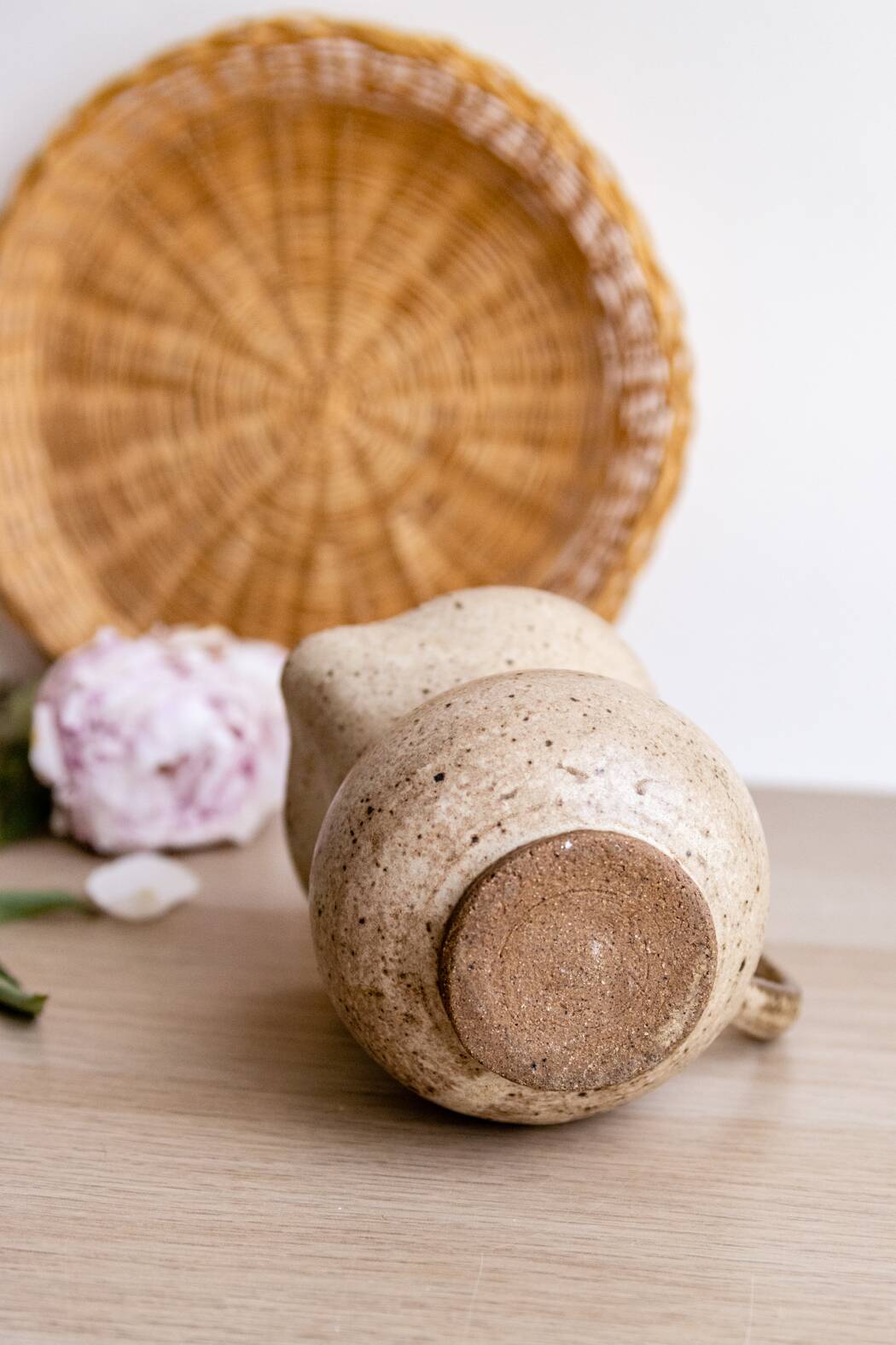 Small pitcher in old speckled stoneware