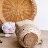 Small pitcher in old speckled stoneware