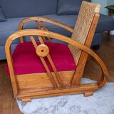 Ancien fauteuil bas colonial style Art Déco en bois.