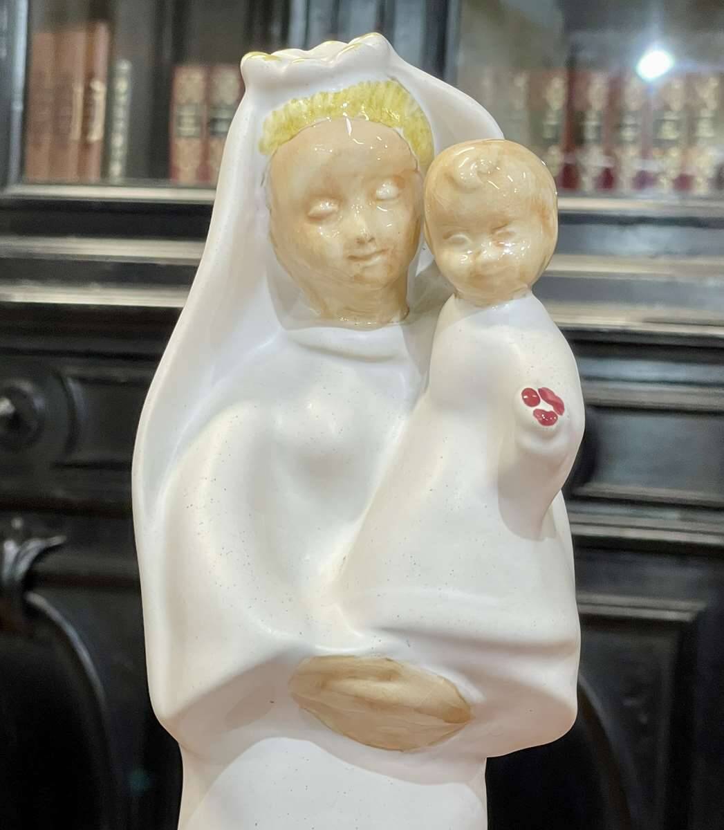 Virgin and child in quimper faience with ivory background by bel delecourt