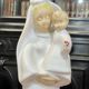 Virgin and child in quimper faience with ivory background by bel delecourt