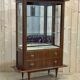 60s showcase in rosewood, mahogany and leather handles
