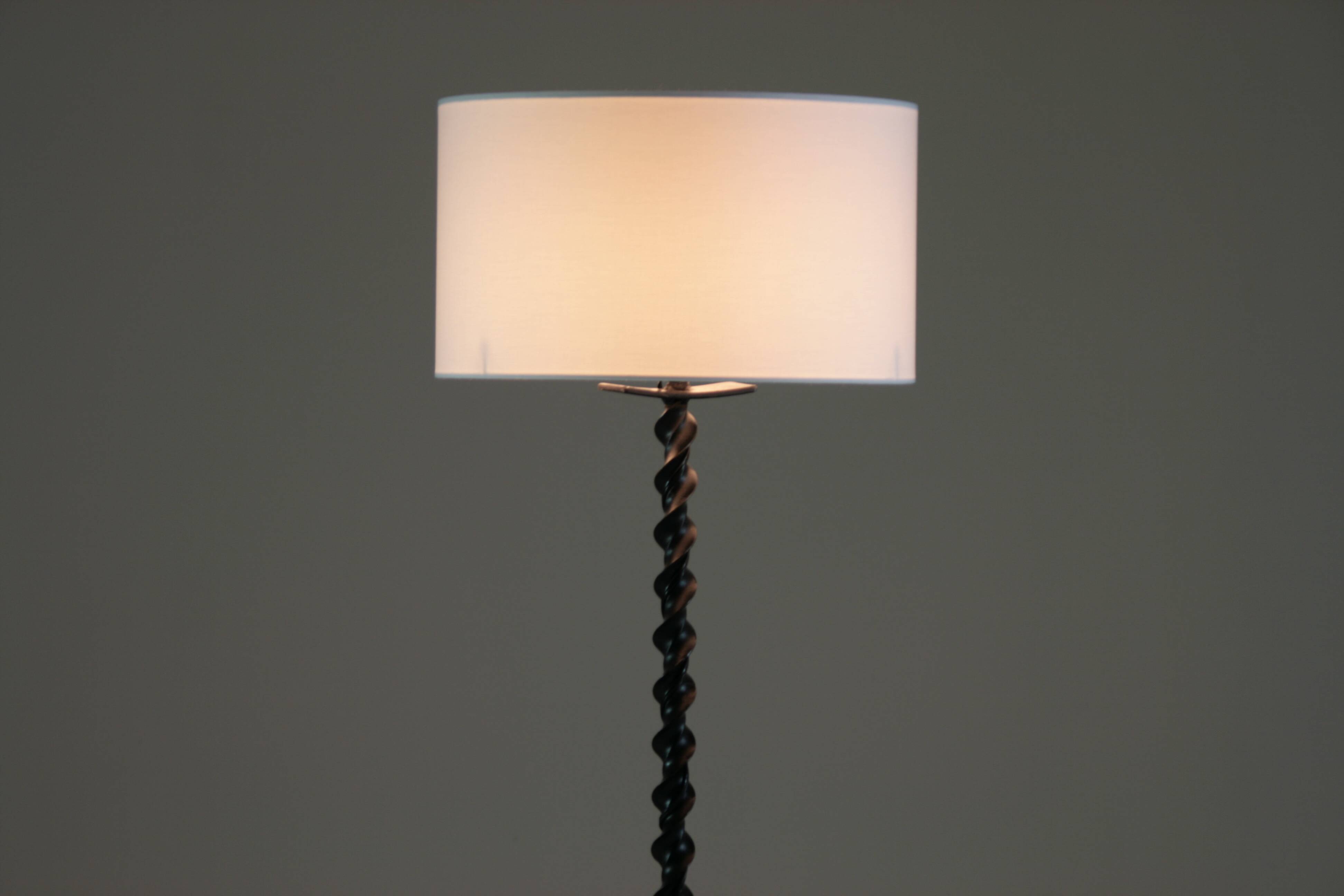 Twisted black metal brutalist floor lamp