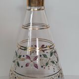 Antique golden carafe with colorful patterns