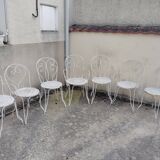 Wrought iron garden furniture from the early 20th century.