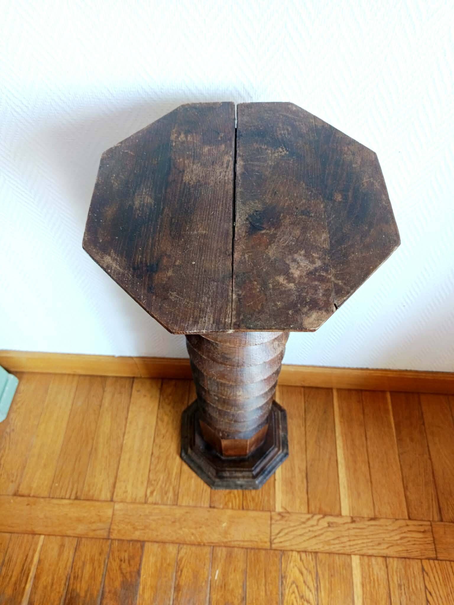 Screw press stool in carved wood