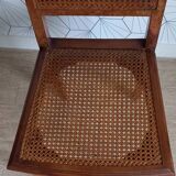 Chaise cannée art déco avec ornements en bronze.