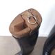 Old wooden shoe trees and their vintage leather rider boots. 1950