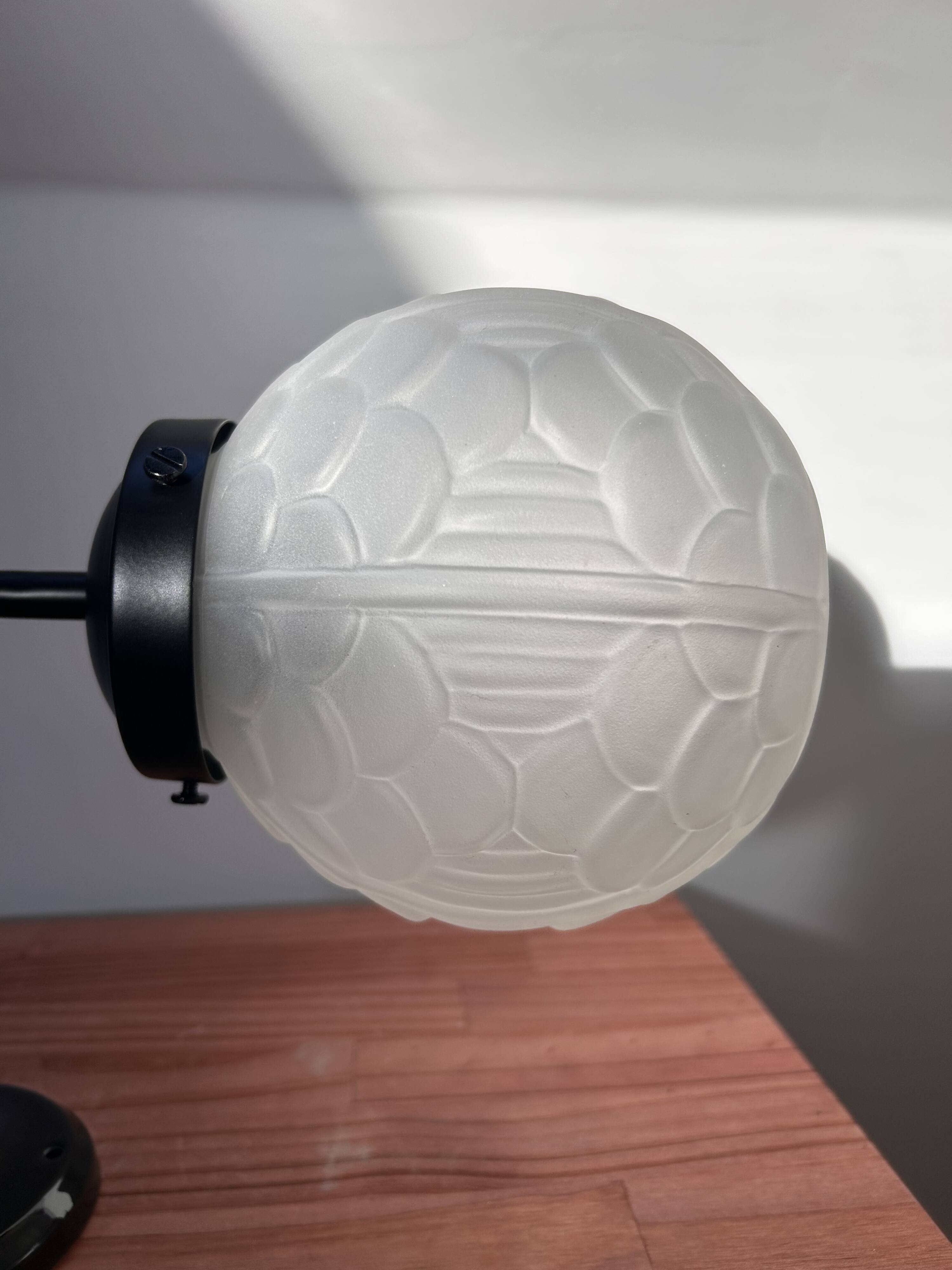 Black art deco wall light