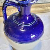 Antique iron-rich earth bottle from Saint Uze, ceramic carafe jug.