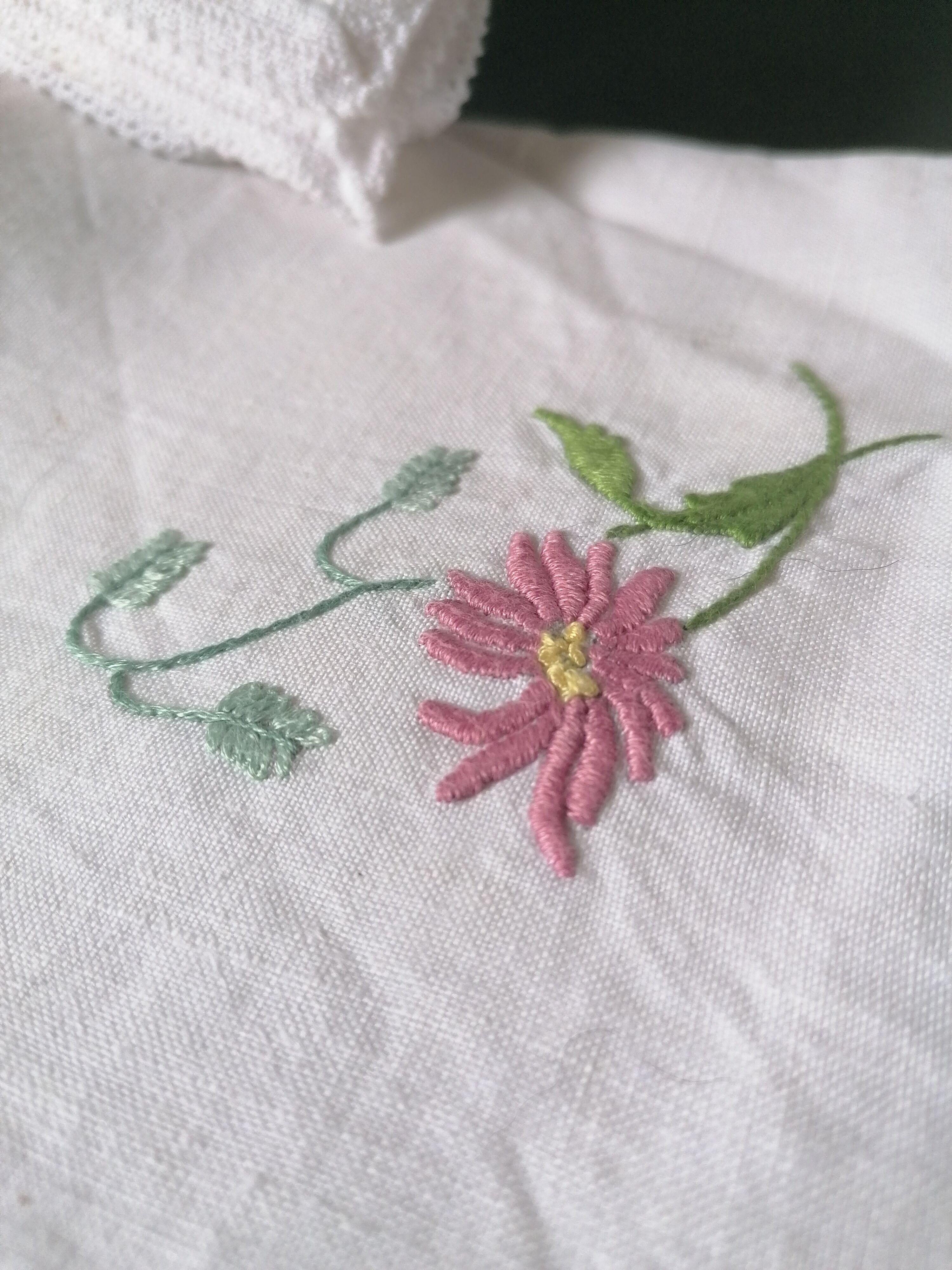 Hand embroidered "flower" and lace embroidered napkins