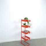 Rood metalen winkelvitrine winkelrek met manden vintage