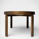 round brutalist extendable dining table from the 60s/70s