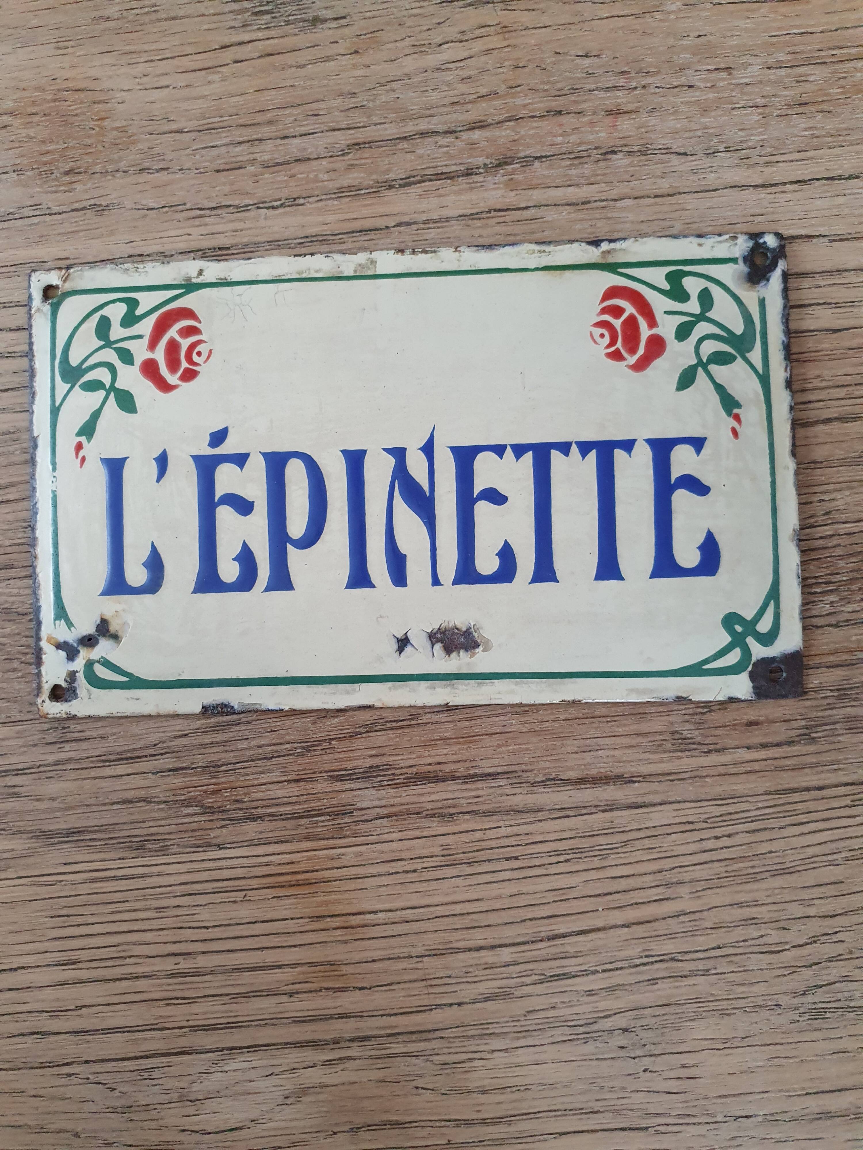 Old enameled house plate