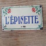 Old enameled house plate