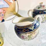 Small milk jug and sugar bowl from Japan with floral patterns from the 1930s/1940s.