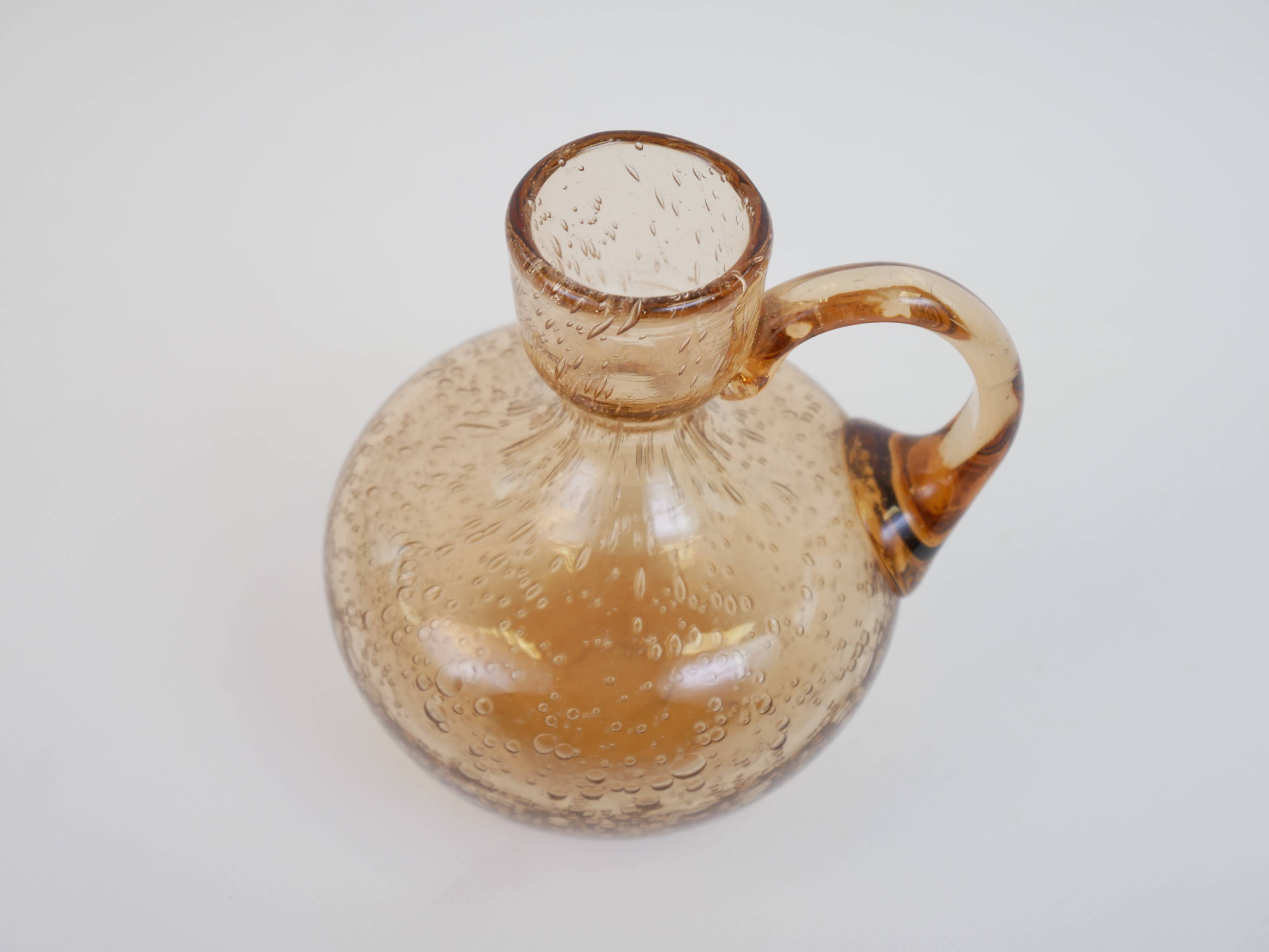 Petit porte bougie en verre bullé rose de Biot