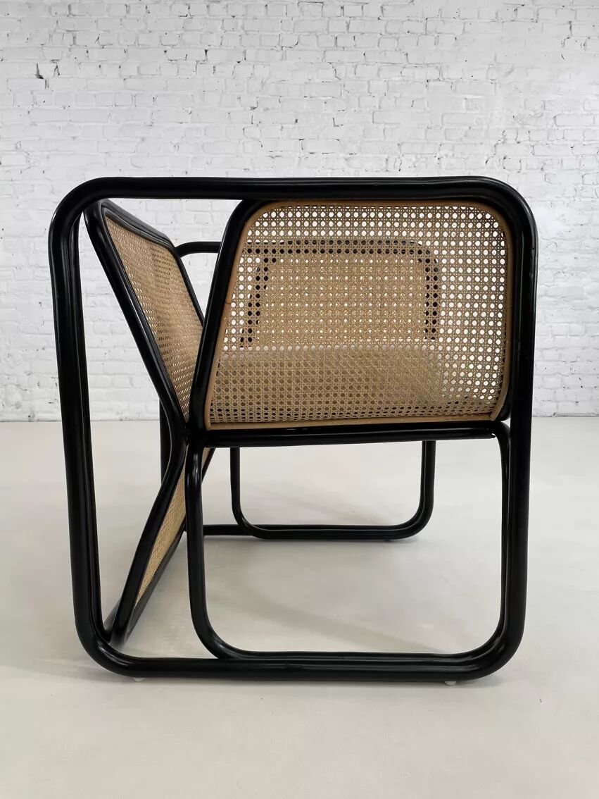 Cubic armchair in black rattan and canework