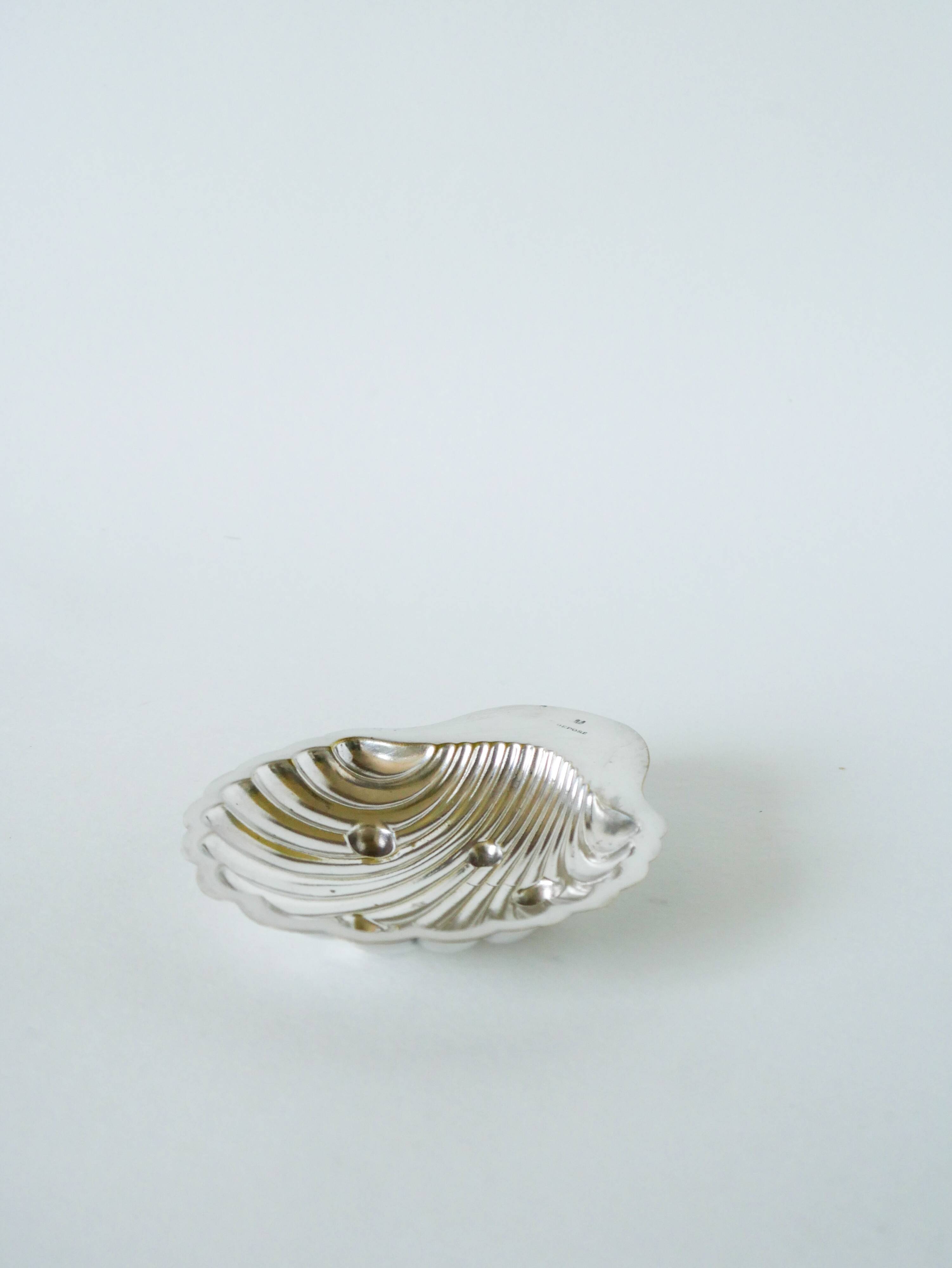 Shell pocket in silver metal, hallmarked, 20th century