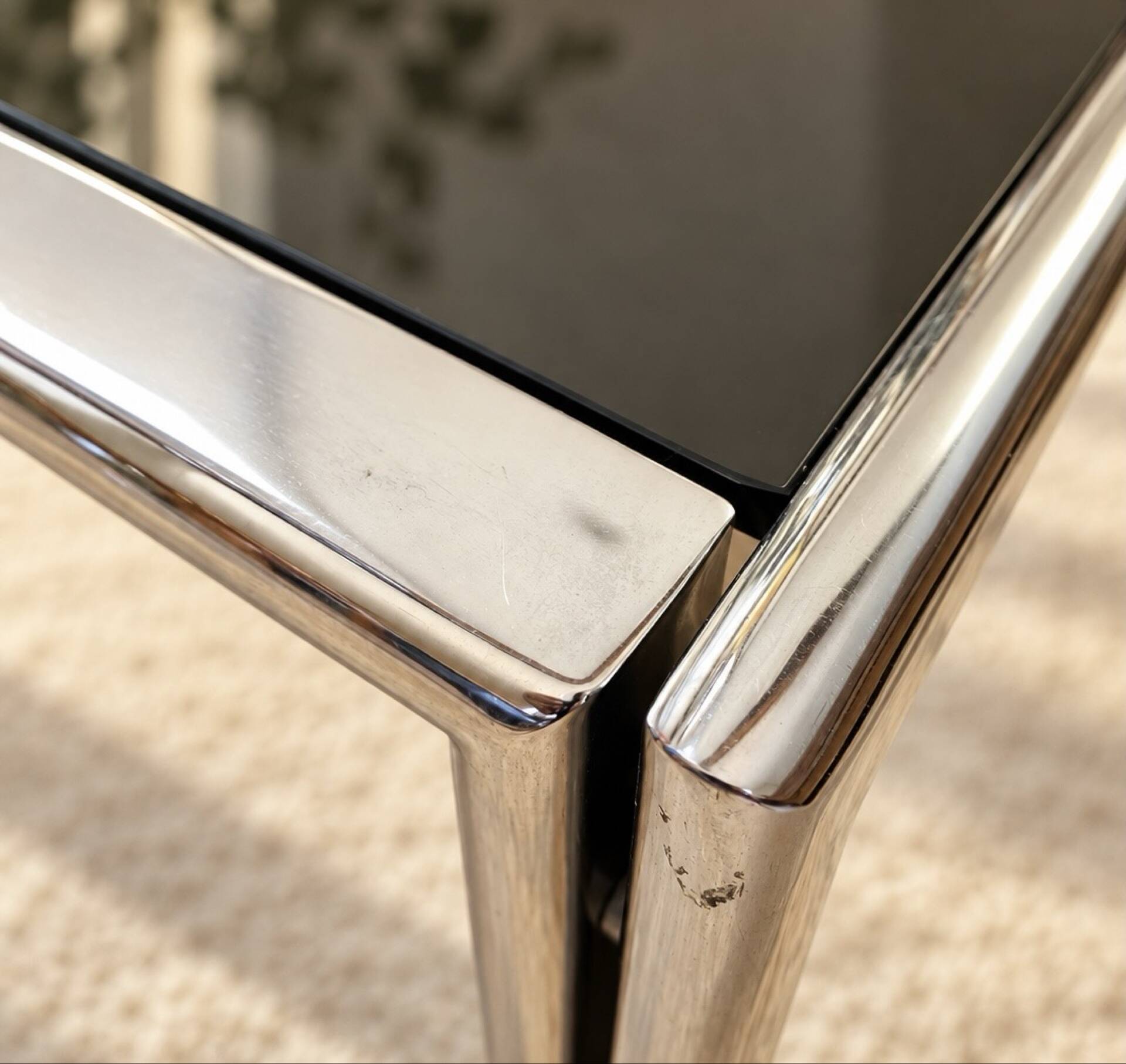 Vintage coffee table in chrome and smoked glass – 1970s/80s