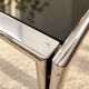 Vintage coffee table in chrome and smoked glass – 1970s/80s