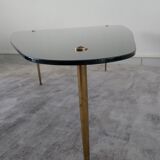 Tripod vintage black glass coffee table