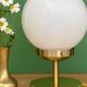 Vintage globe table lamp in white opaline.