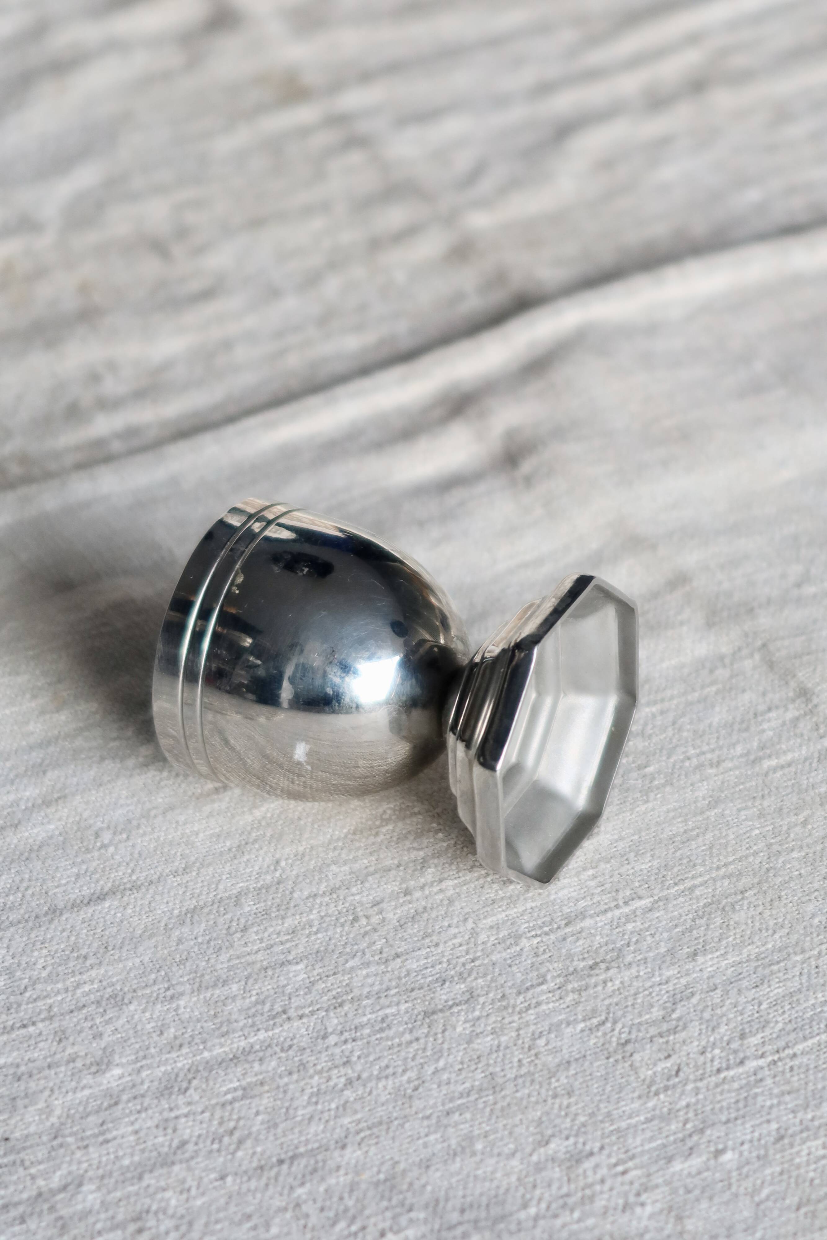 Vintage silver-plated egg cup with an octagonal base.