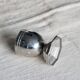 Vintage silver-plated egg cup with an octagonal base.