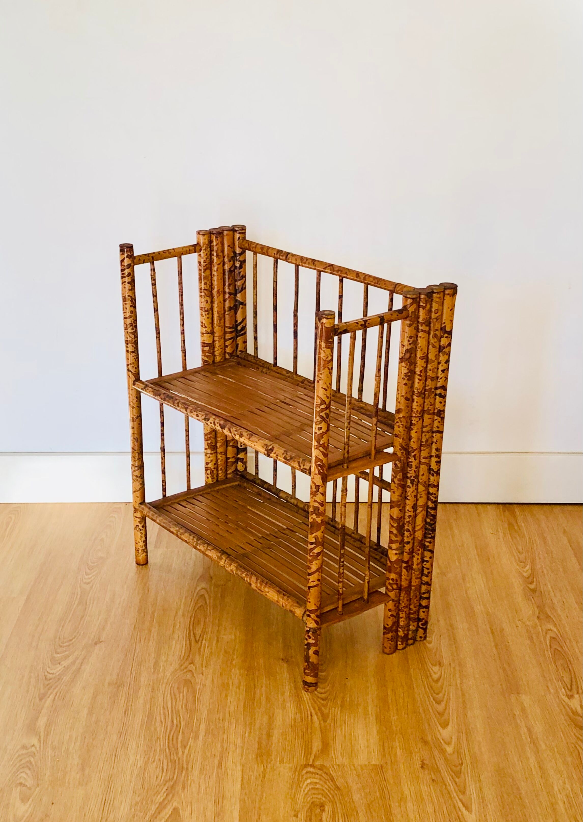 Folding speckled bamboo shelf