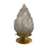 Old laying flame lamp