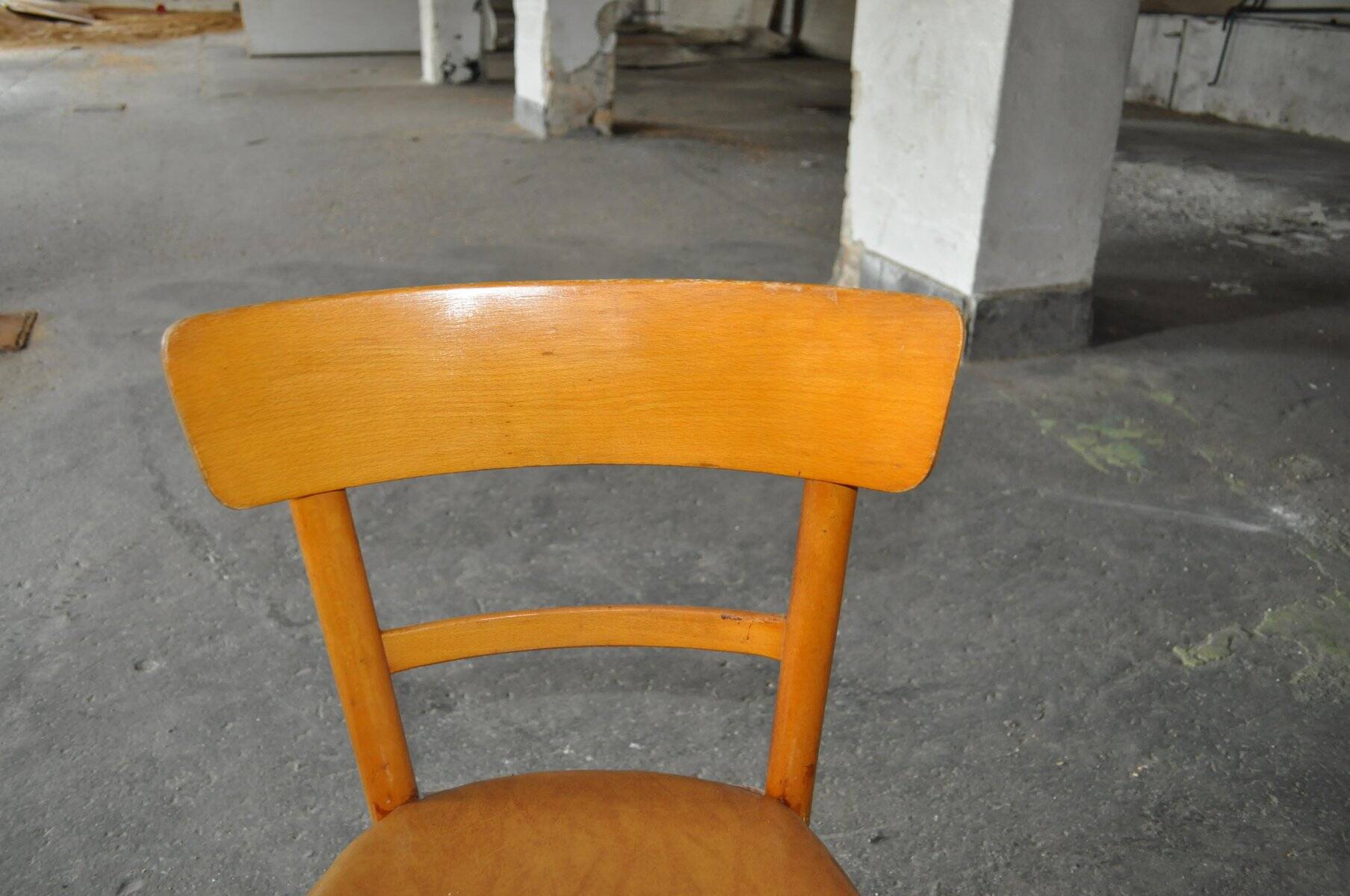 Vintage chair in brown faux leather and light wood, 1960s, padded seat.